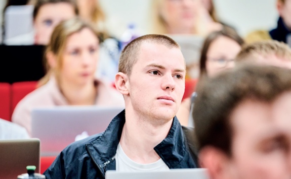 Students in a lecture theatre.